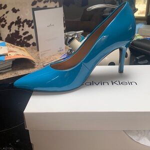 Brand New in box Calvin Klein pumps- beautiful baby blue!